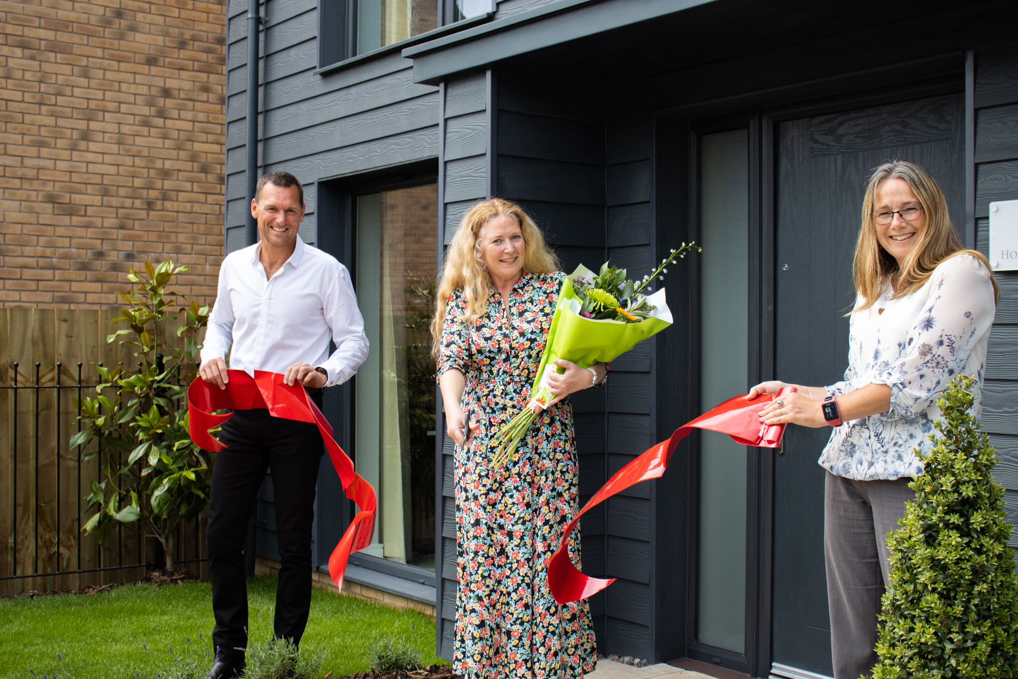 School teacher is guest of ‘honour’ at official opening at Baker Estates’ show home in Bridport